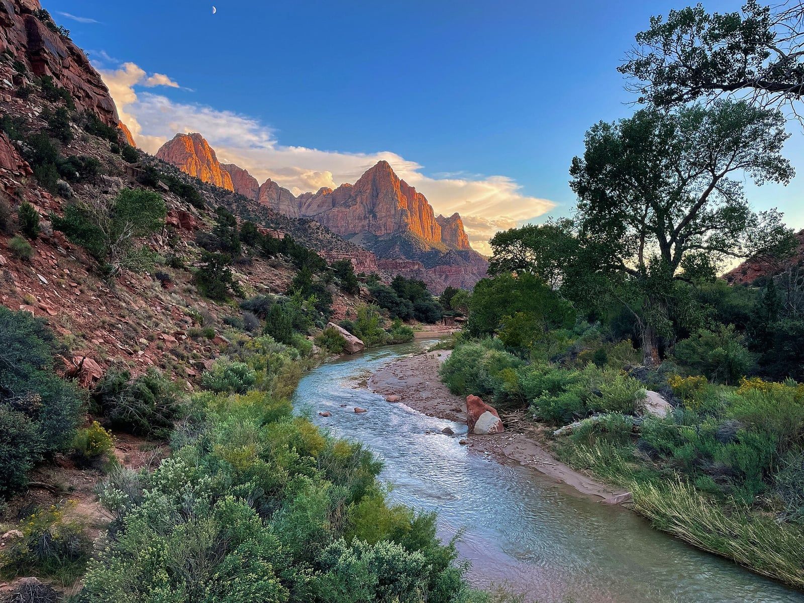 Virgin River and the Watchman at Sunset, Zion National Park The Virgin River winds through Zion Canyon at sunset with the Watchman glowing golden in the background.